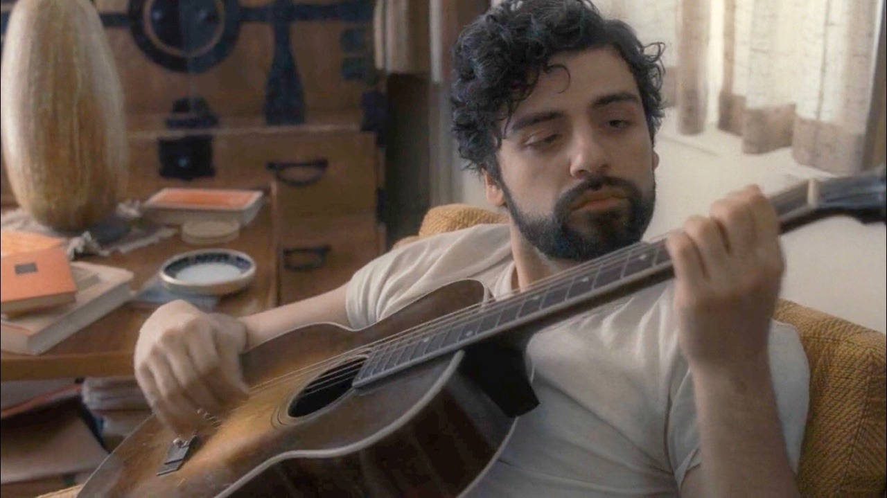 Inside Llewyn Davis Playing His Guitar Wallpaper