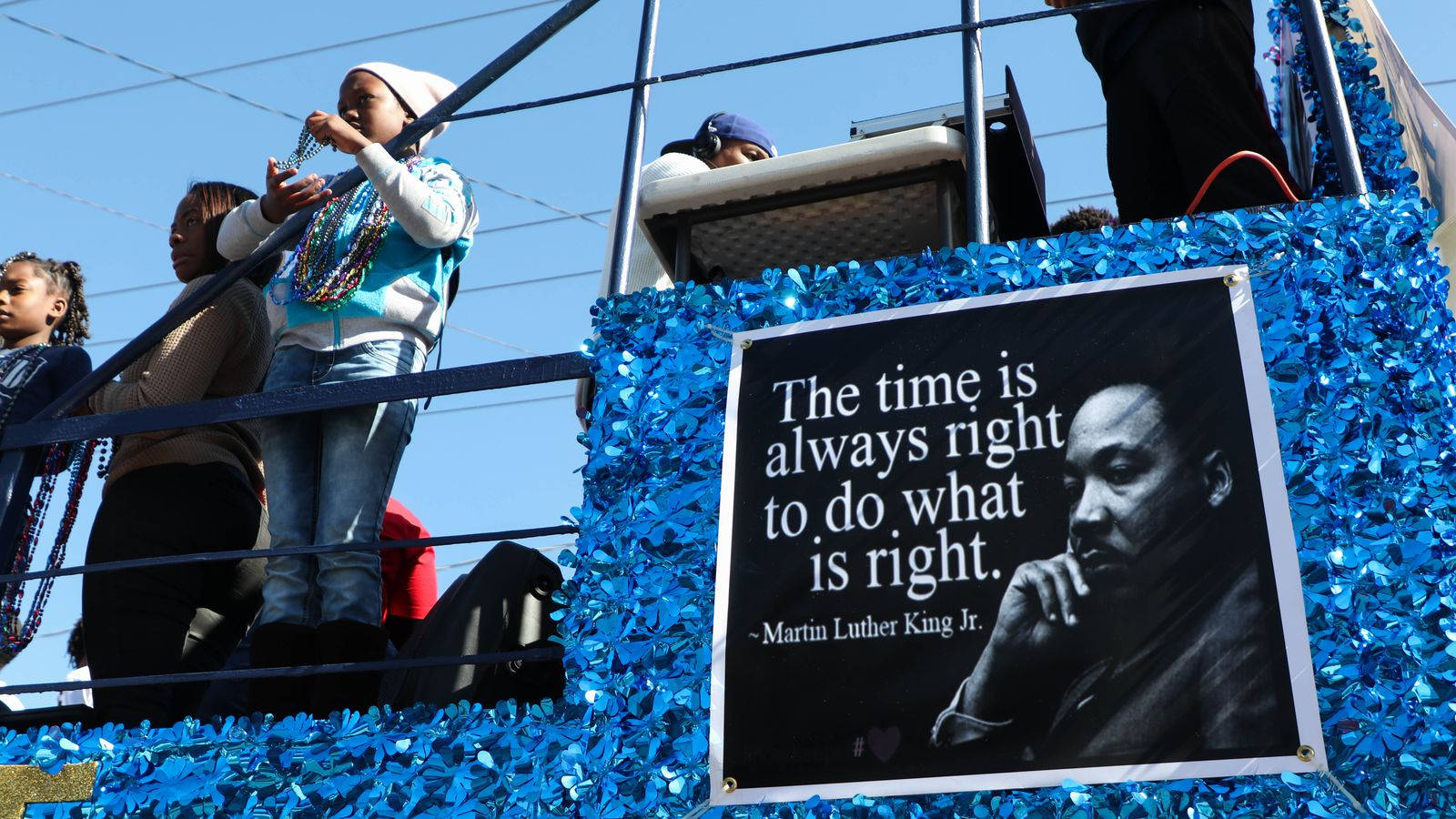 Inspirational Martin Luther King Jr. Poster On Stadium Bleachers Wallpaper