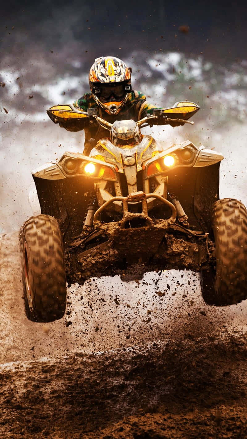 Intense A T V Offroad Action Wallpaper