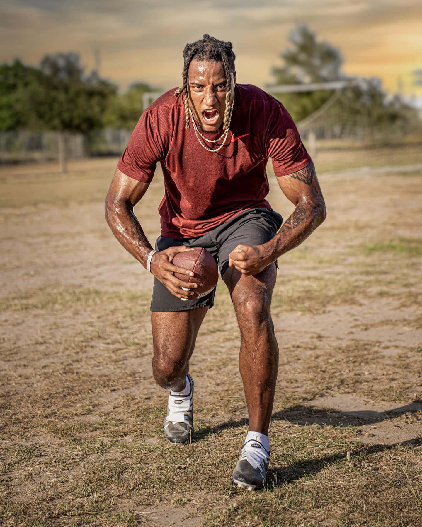 Intense Football Training Outdoors Wallpaper