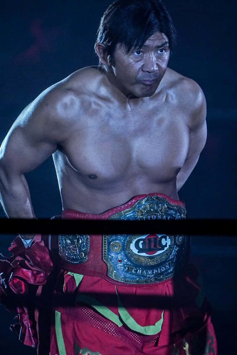 Intense Martial Artistwith Championship Belt Wallpaper