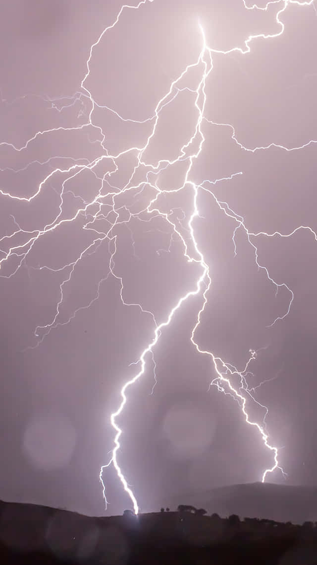 Intense Nighttime Lightning Strike Wallpaper