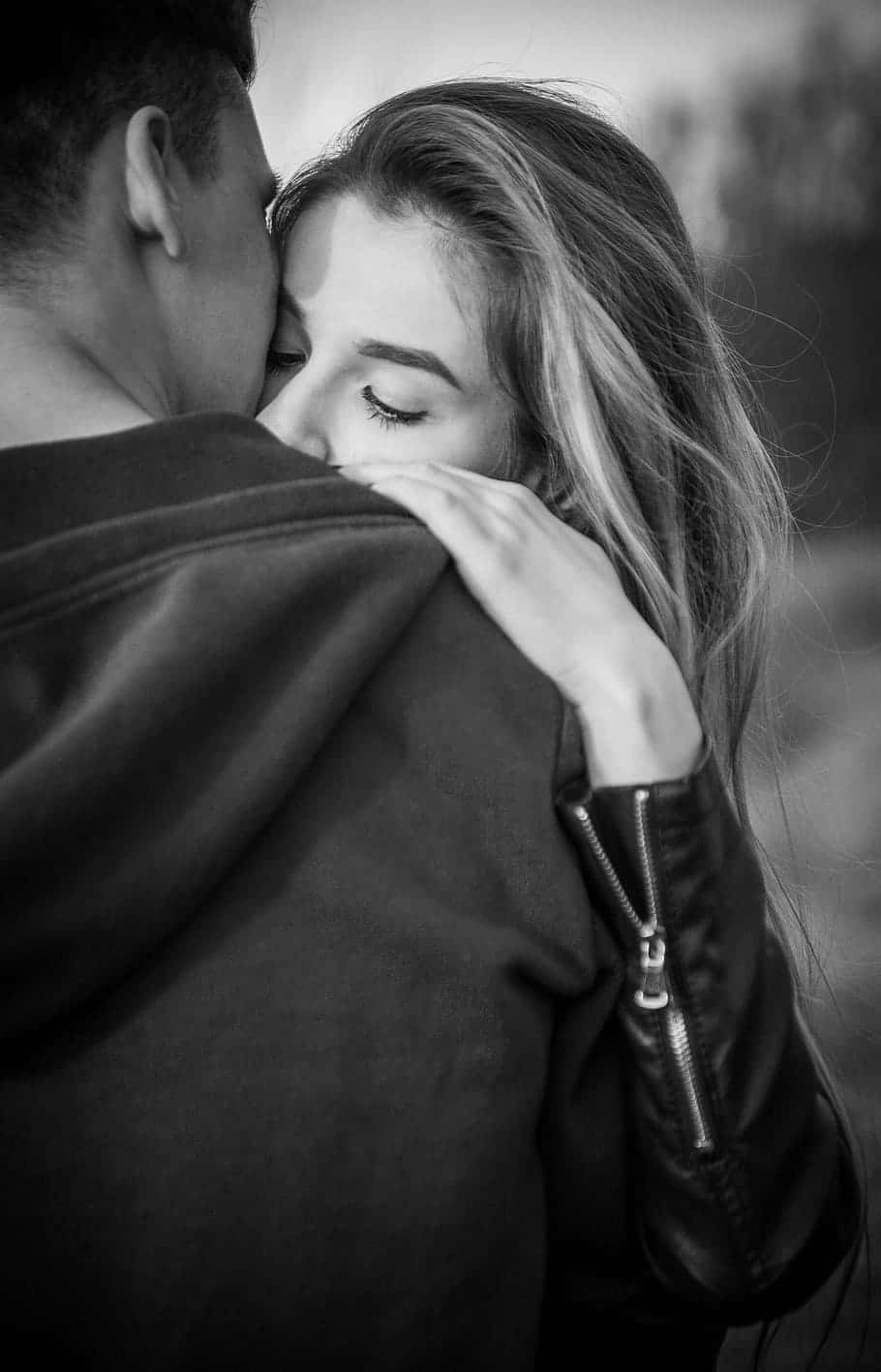 Intimate Couple Hug Blackand White Wallpaper