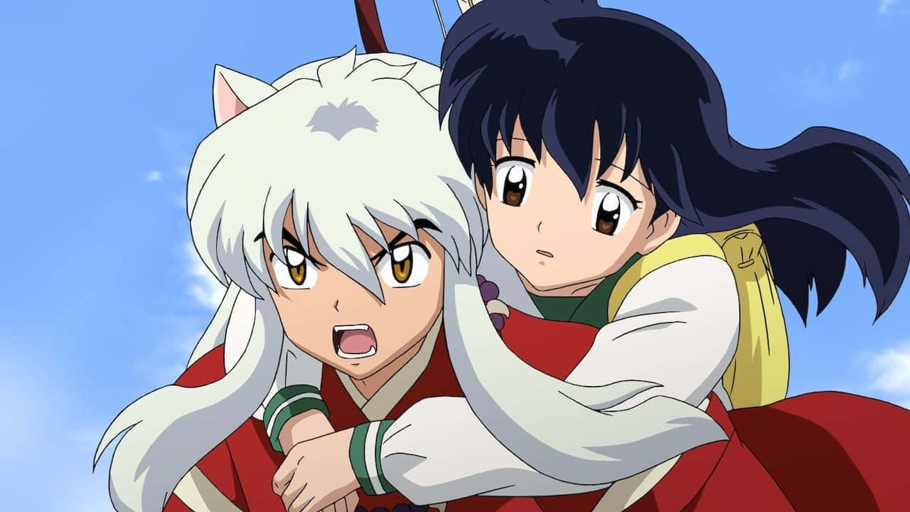 Inuyasha And Kagome Sharing A Serene Moment Together Wallpaper