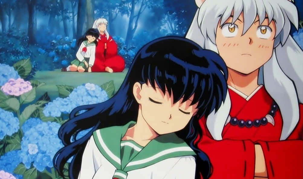 Inuyasha And Kagome Sharing A Tender Moment Wallpaper