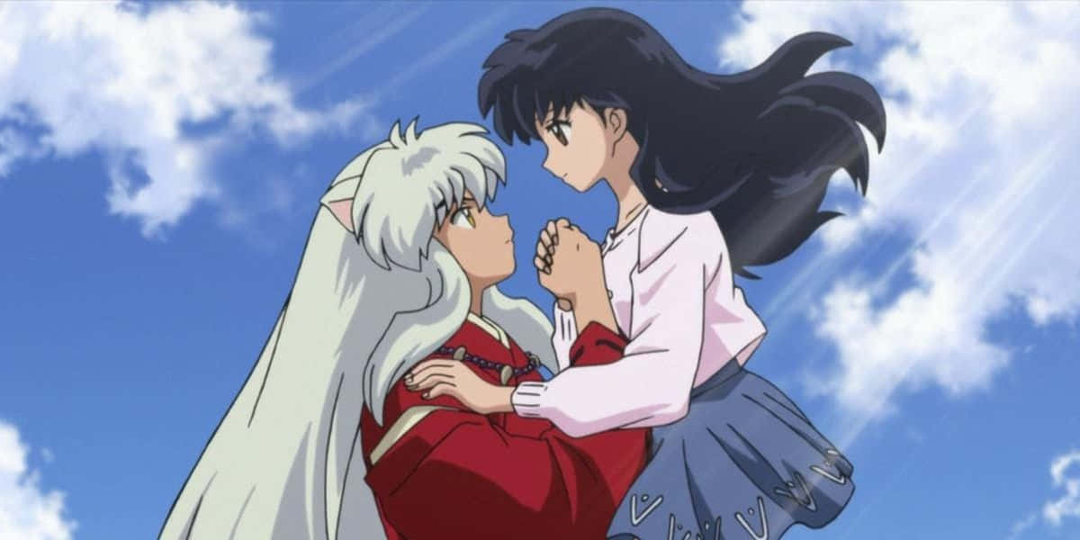 Inuyasha And Kagome Sharing An Embrace Wallpaper