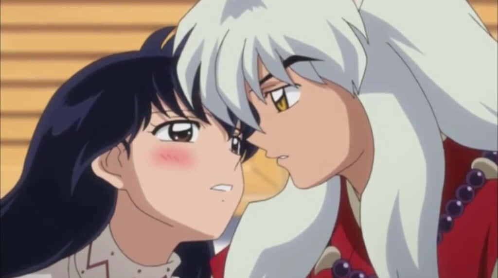 Inuyasha And Kagome Sharing An Intimate Moment Wallpaper