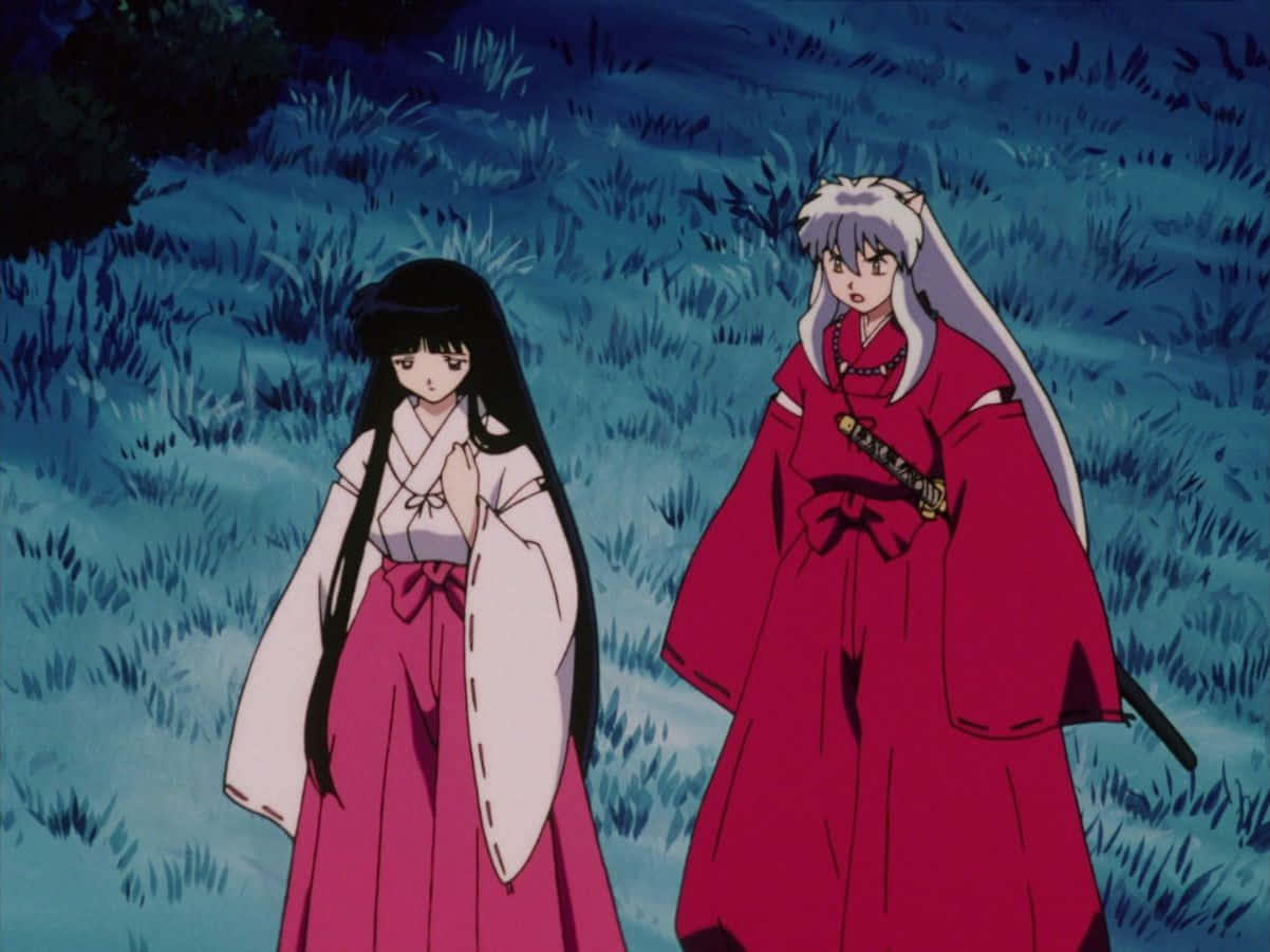 Inuyasha And Kikyo In A Tender Moment Wallpaper