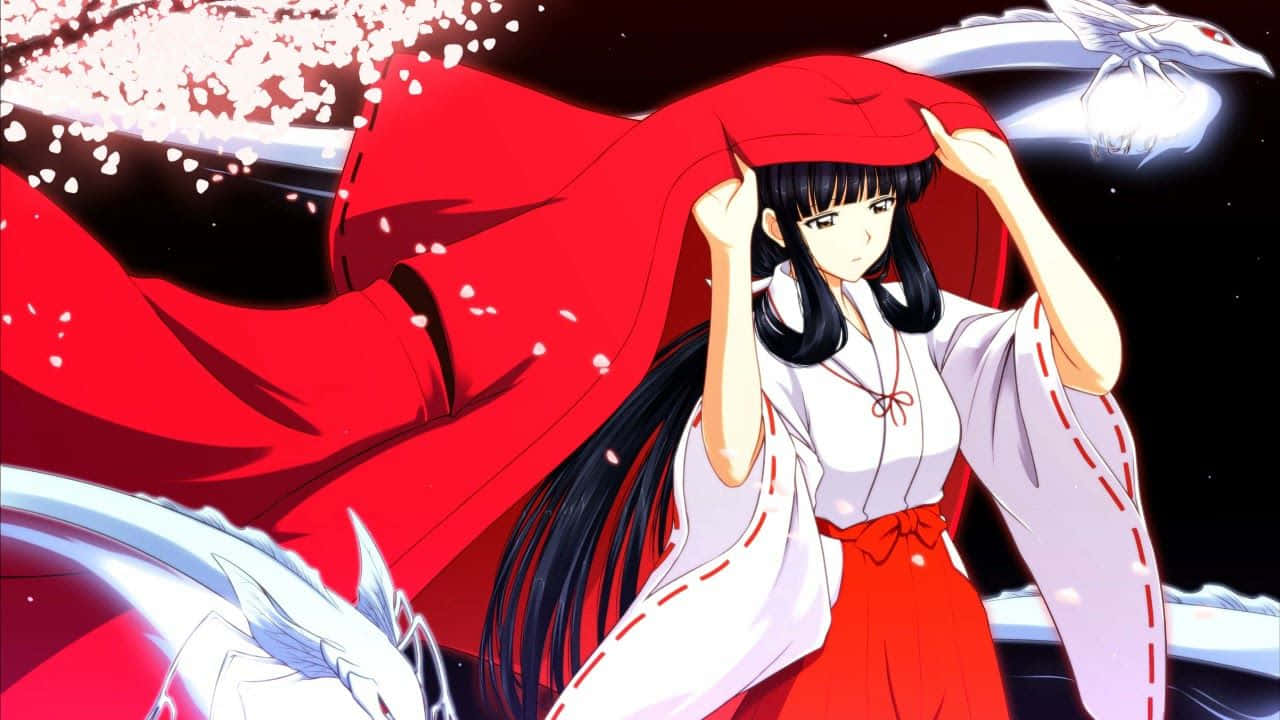 Inuyasha And Kikyo Share A Tender Moment Amidst A Backdrop Of Vibrant Colors Wallpaper