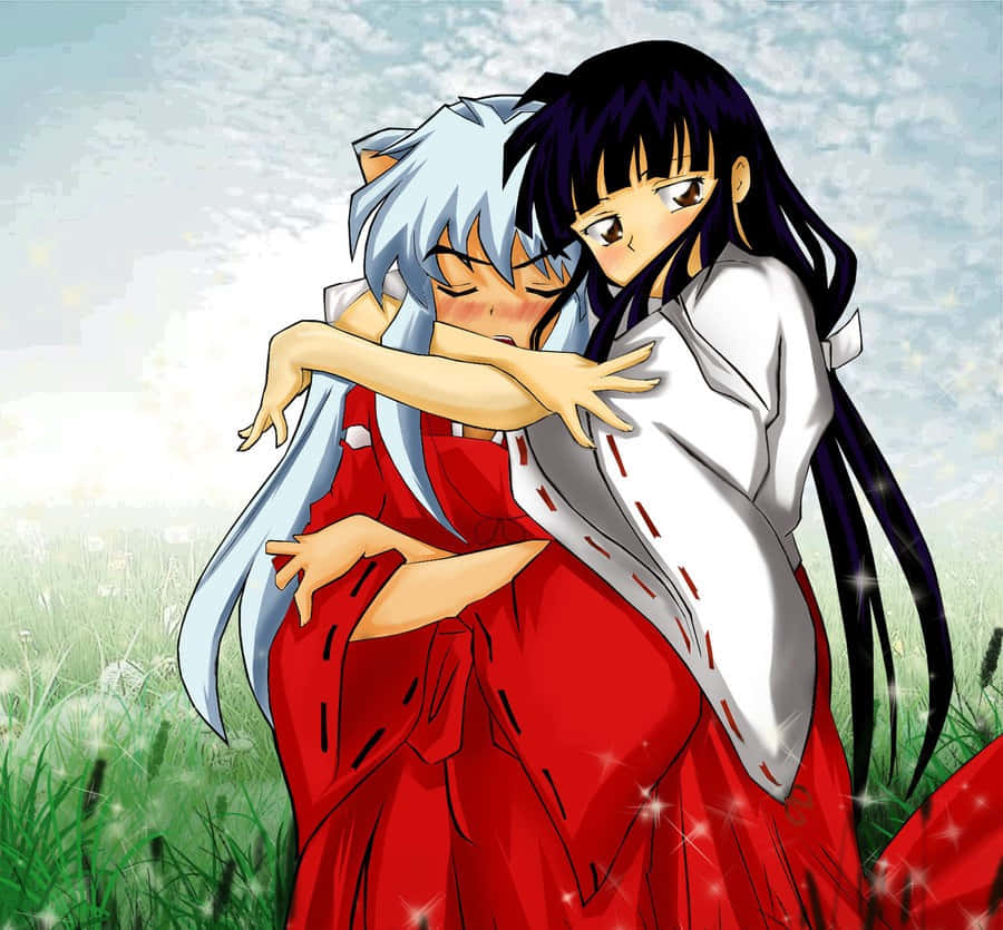 Inuyasha And Kikyo Sharing A Heartfelt Moment Wallpaper