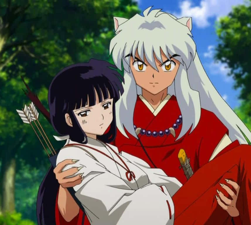 Inuyasha And Kikyo Staring Intensely At Each Other. Wallpaper