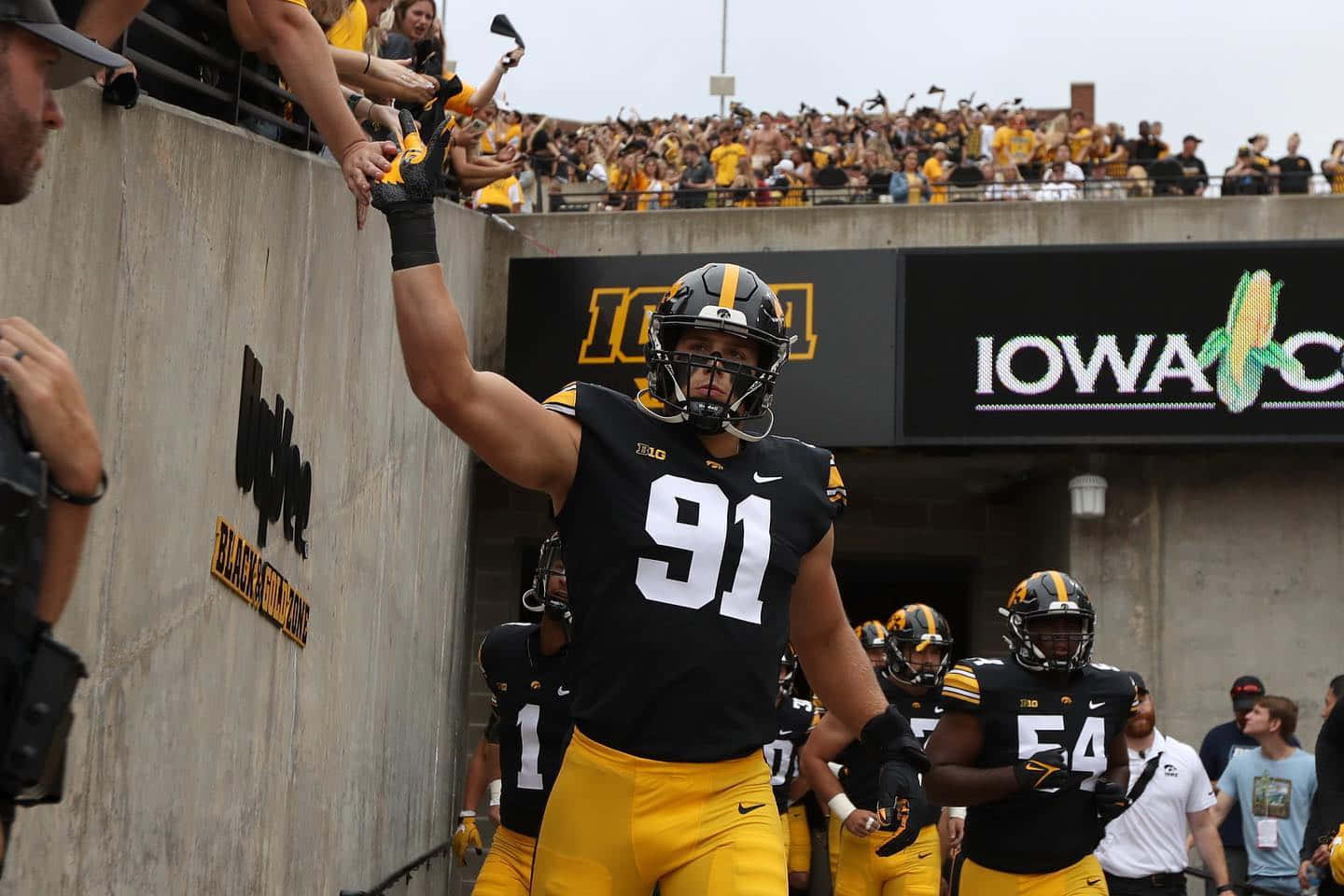 Iowa Football Player High Five Wallpaper