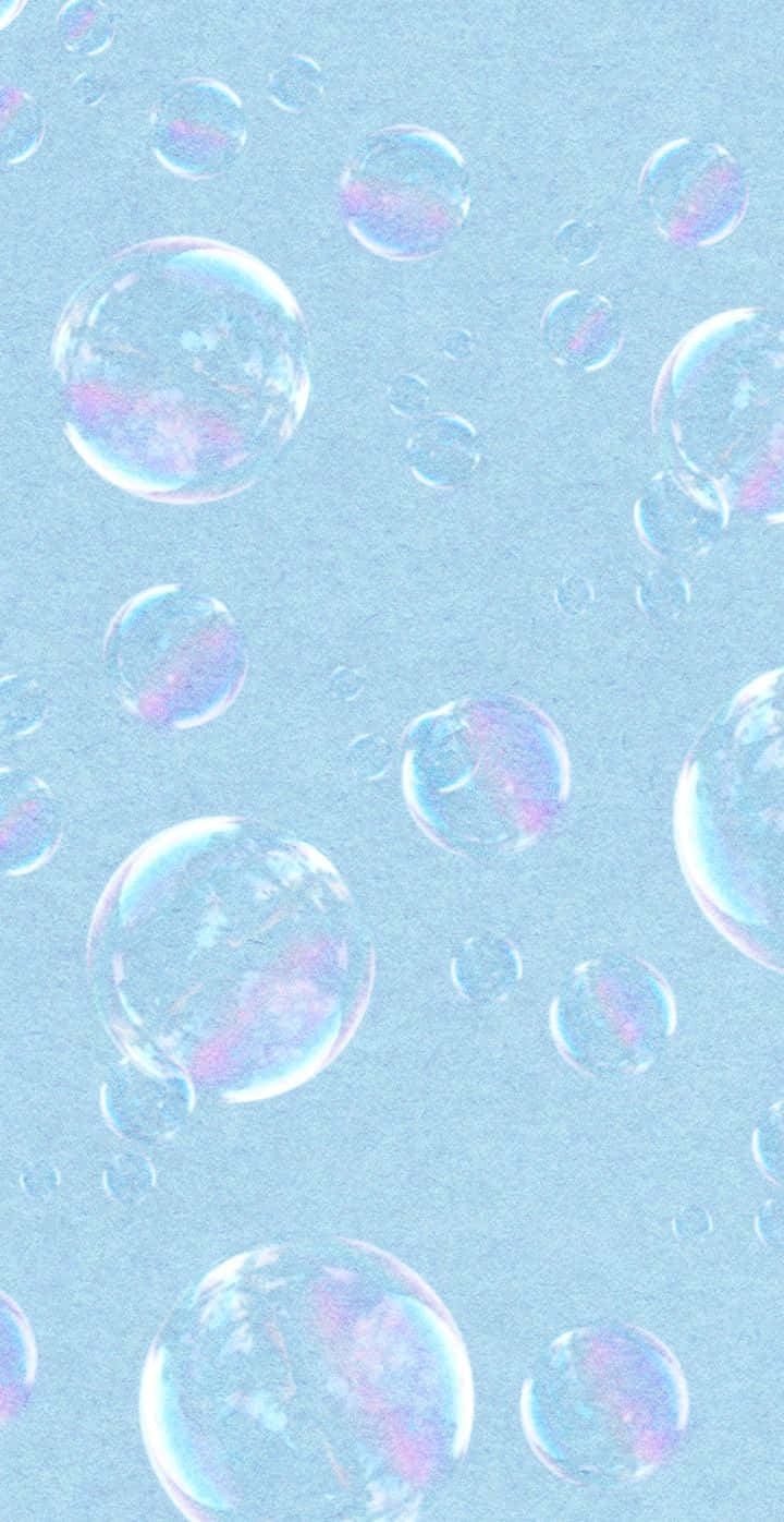 Iridescent Soap Bubbles Blue Background Wallpaper