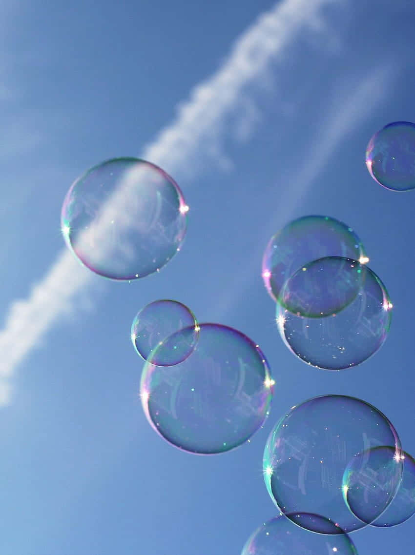 Iridescent Soap Bubbles Sky Background Wallpaper