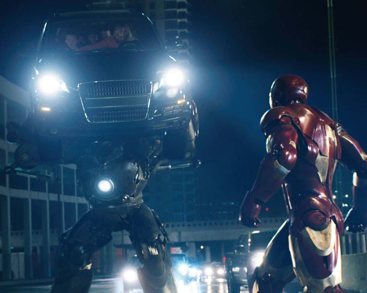 Iron Man Fights Iron Monger In An Epic Showdown Wallpaper