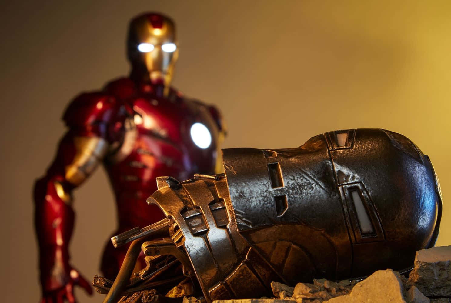 Iron Man Standing Behind Defeated Iron Monger Wallpaper