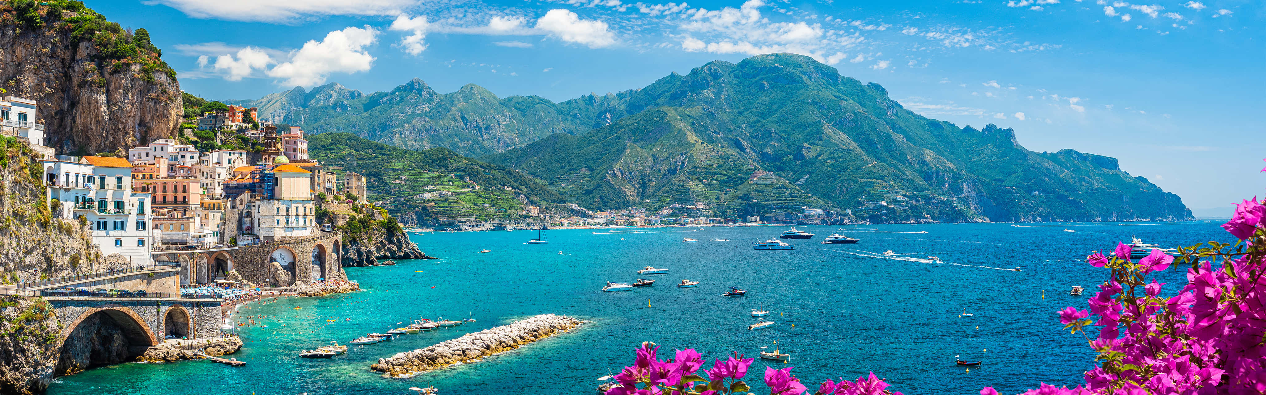 Italian Beach With Crystal Clear Waters And Golden Sand Wallpaper