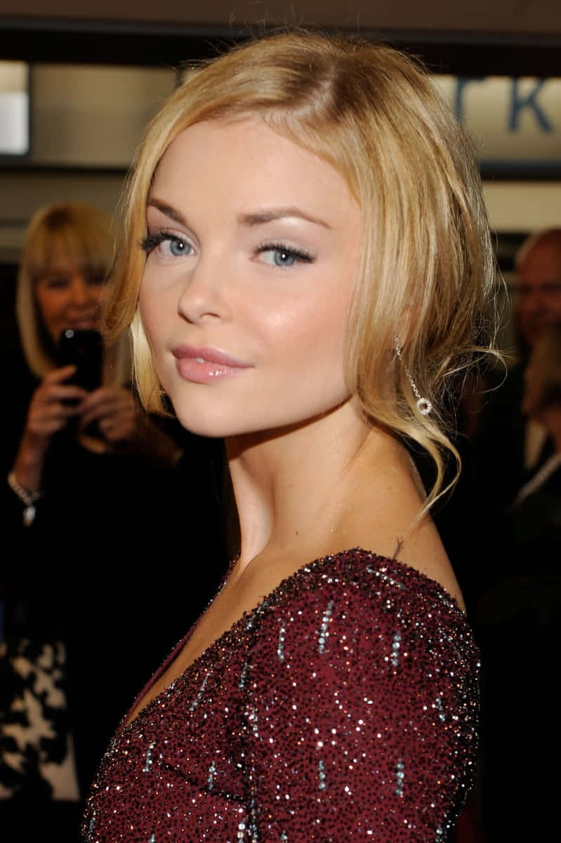 Izabella Miko Looking Captivating In A Red Dress Wallpaper