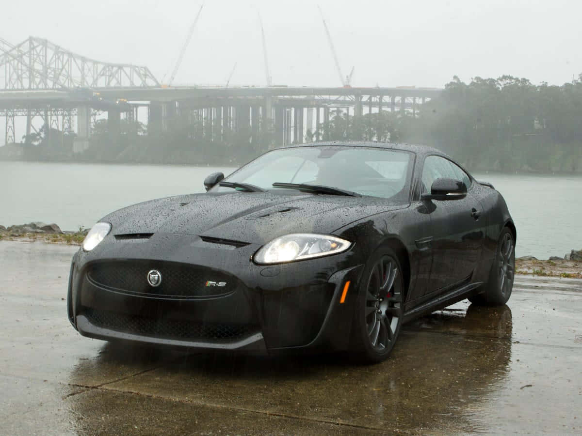 Jaguar X K Rainy Day Bridge Background Wallpaper