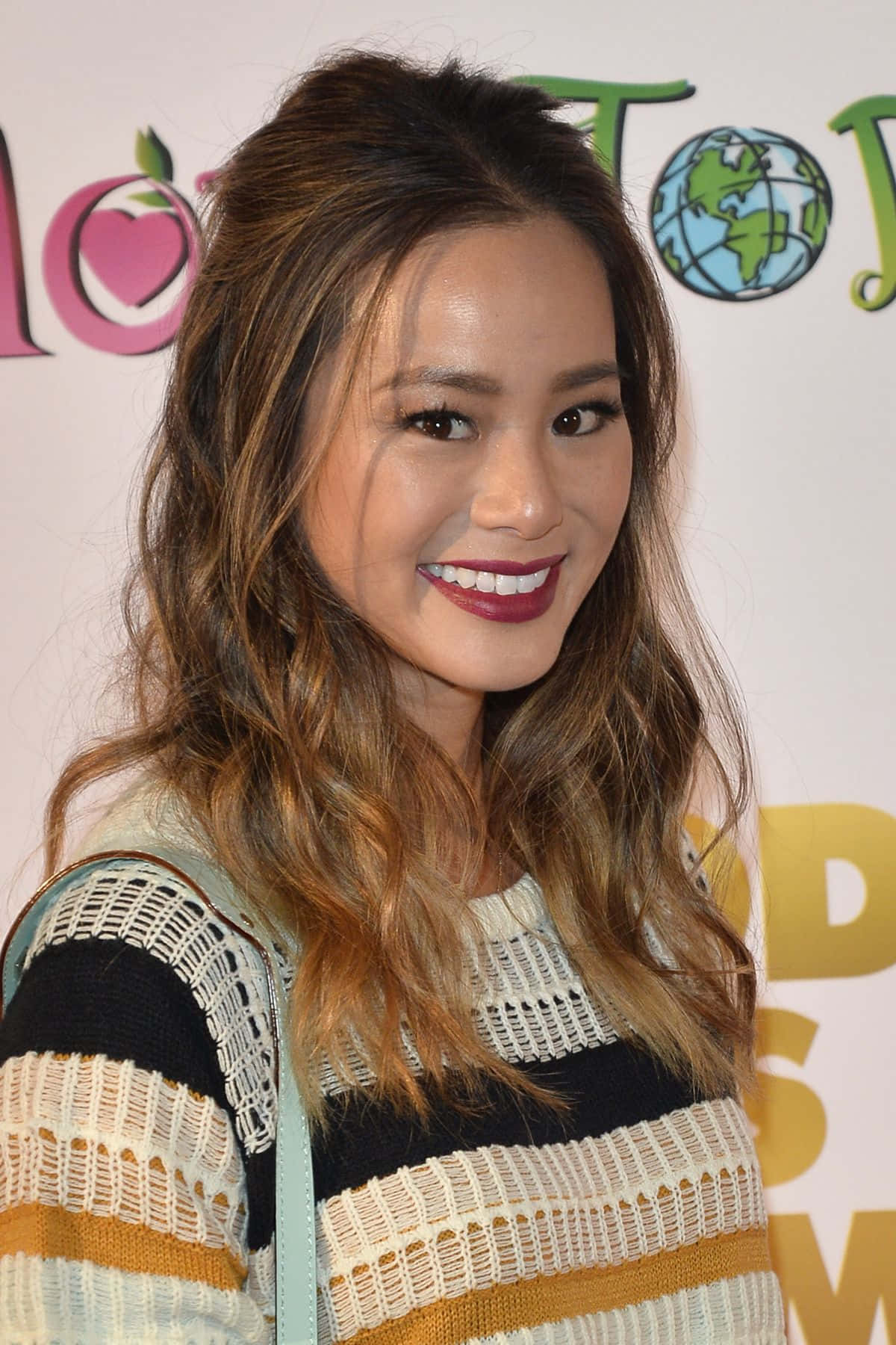 Jamie Chung Striking A Pose During A Photo Shoot Wallpaper