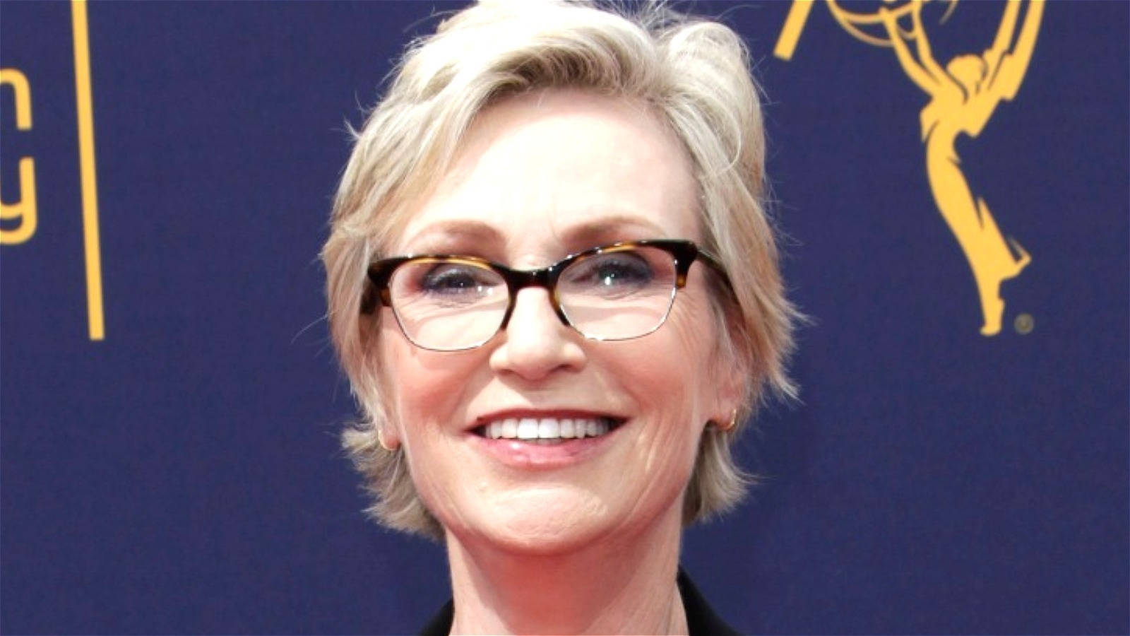 Jane Lynch Actor Smiling Blue Background Wallpaper