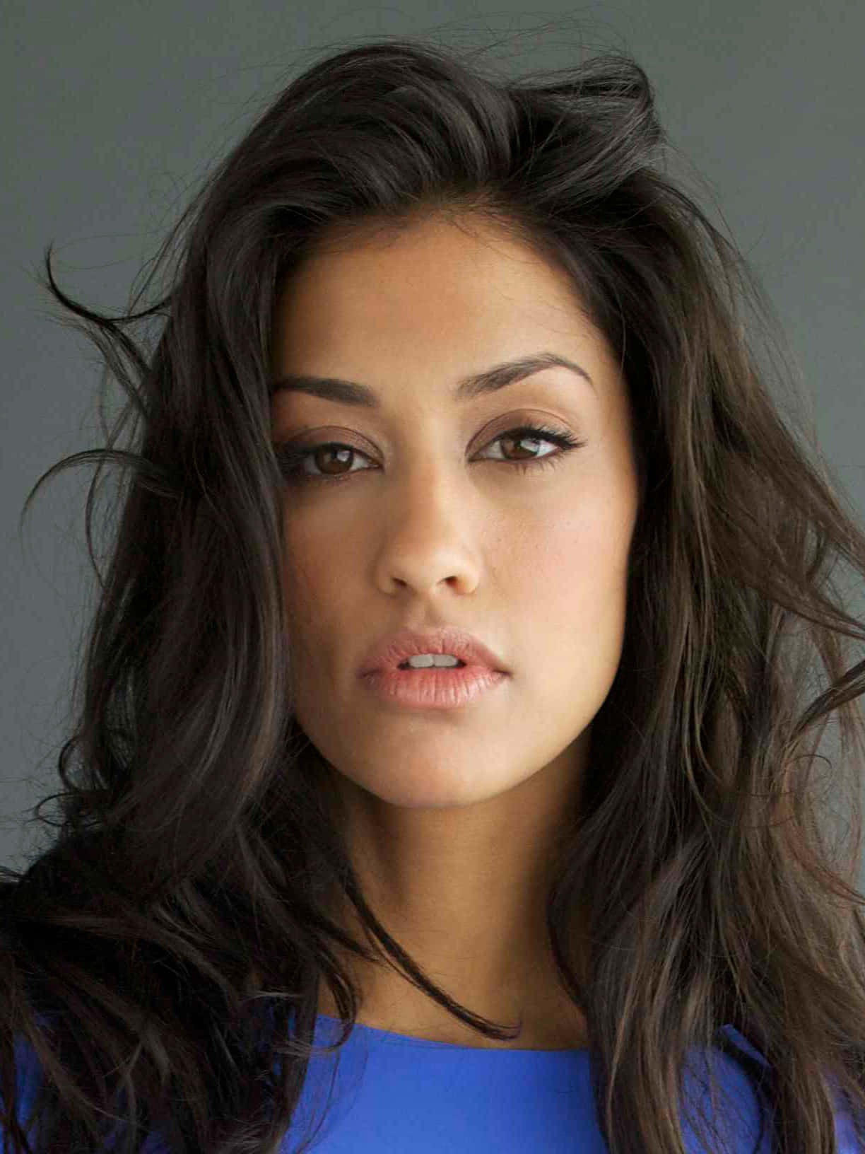 Janina Gavankar Exuding Elegance In A Captivating Pose Wallpaper