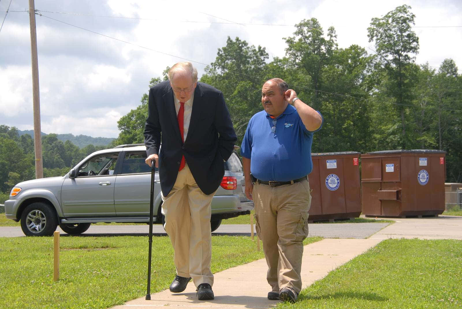 Jay Rockefeller With Man Outside Wallpaper