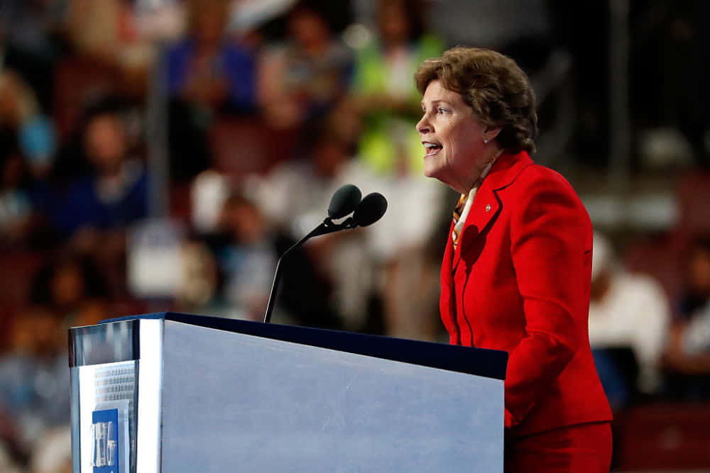 Jeanne Shaheen Wearing Red Wallpaper