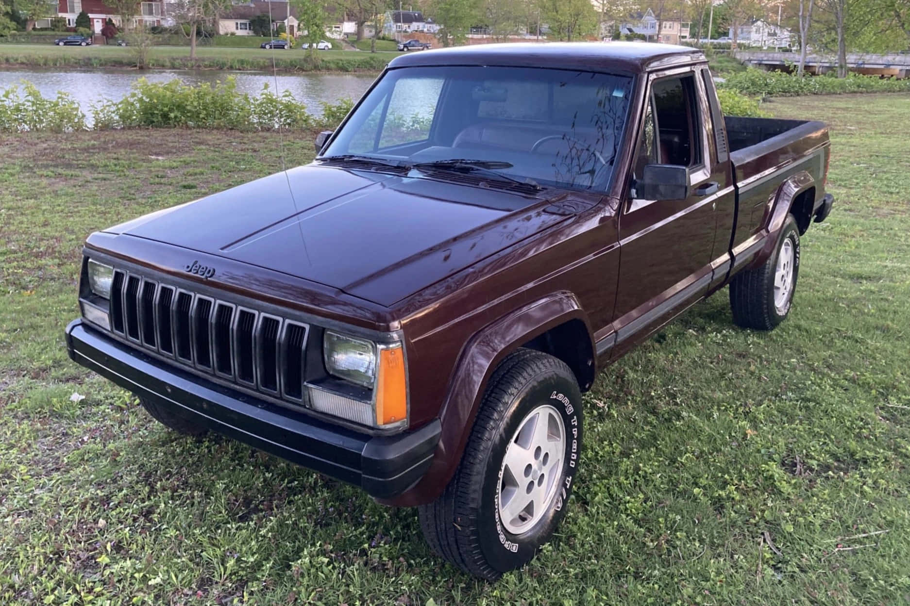 Jeep Comanche Conquering The Rough Terrain Wallpaper