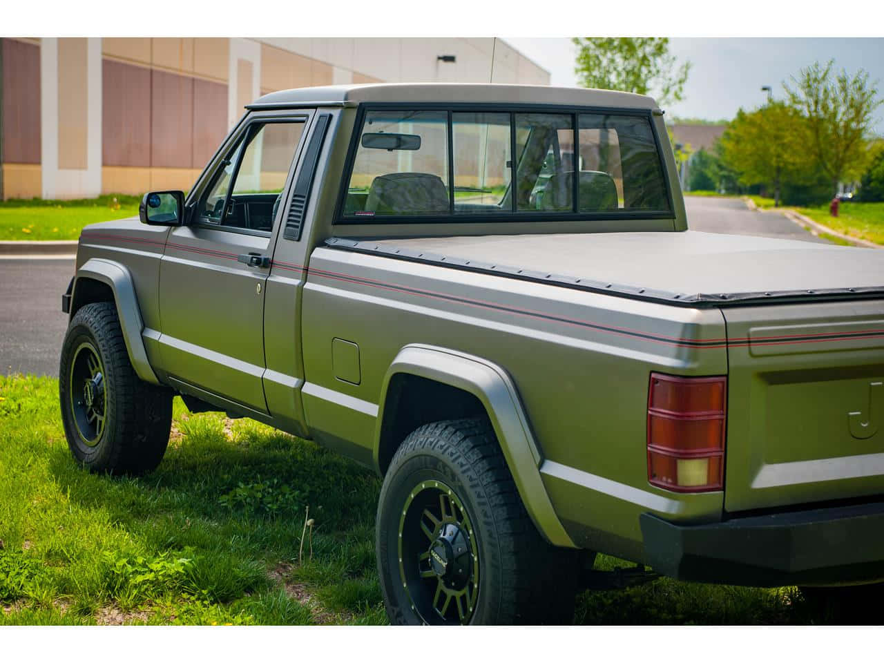 Jeep Comanche Pickup Truck In Action Wallpaper