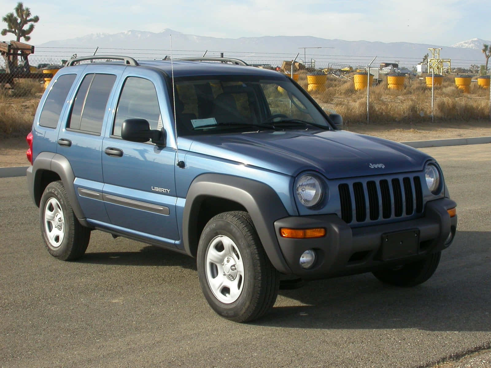 Jeep Liberty Dominating The Open Road Wallpaper