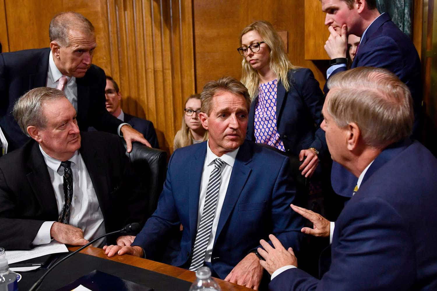 Jeff Flake Engaging In A Political Discussion Wallpaper