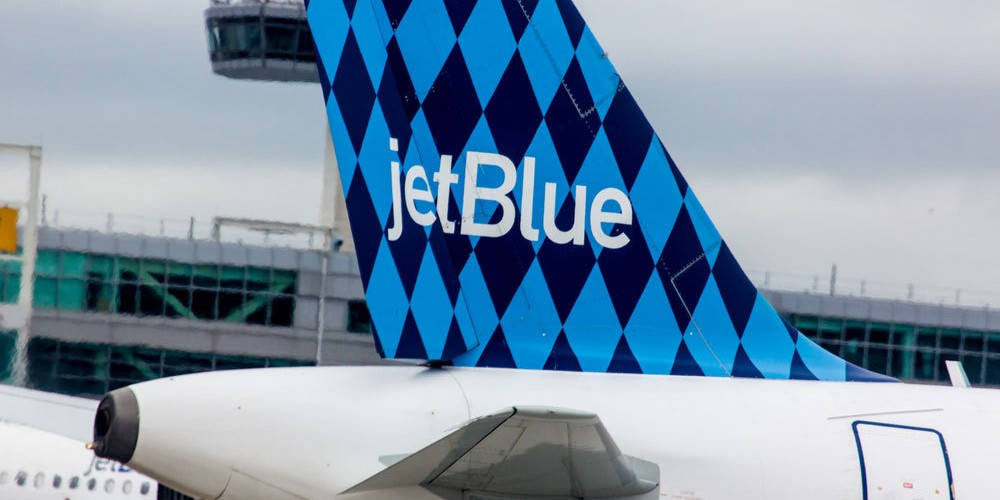 Jetblue Airplane Rudder Blue Diamond Pattern Wallpaper