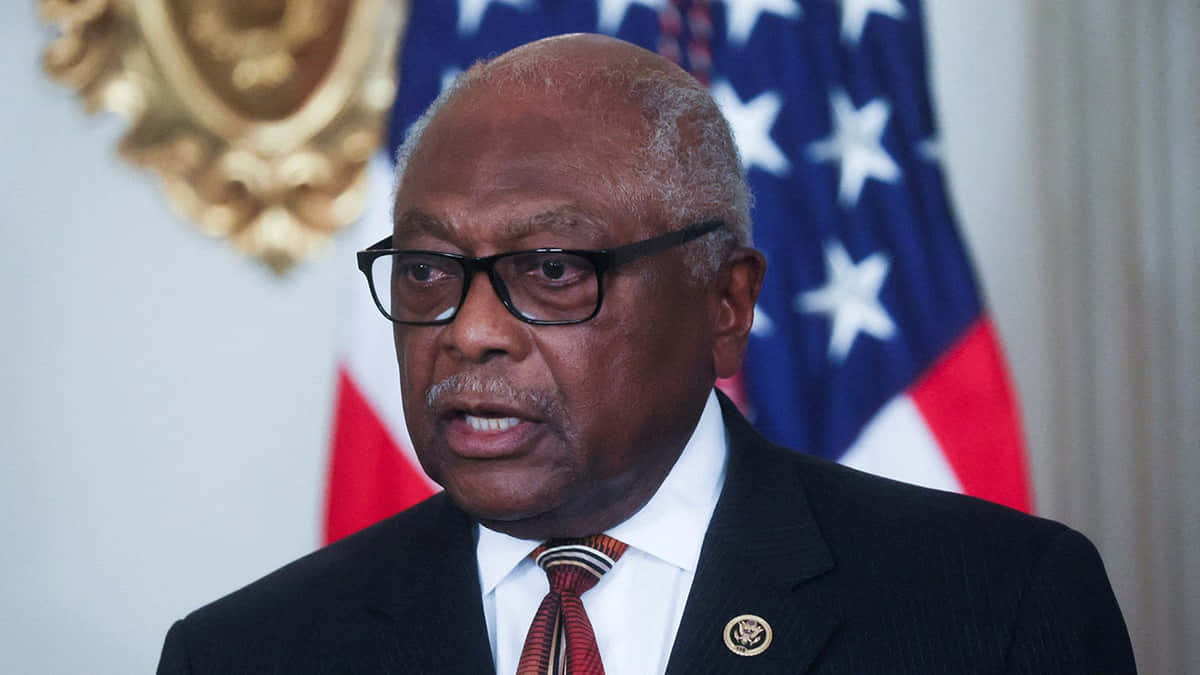 Jim Clyburn Talking With American Flag Wallpaper