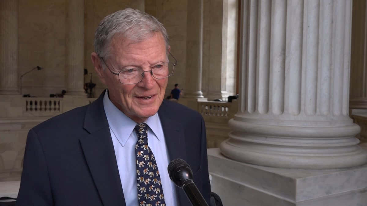 Jim Inhofe Speaking Into Microphone Wallpaper