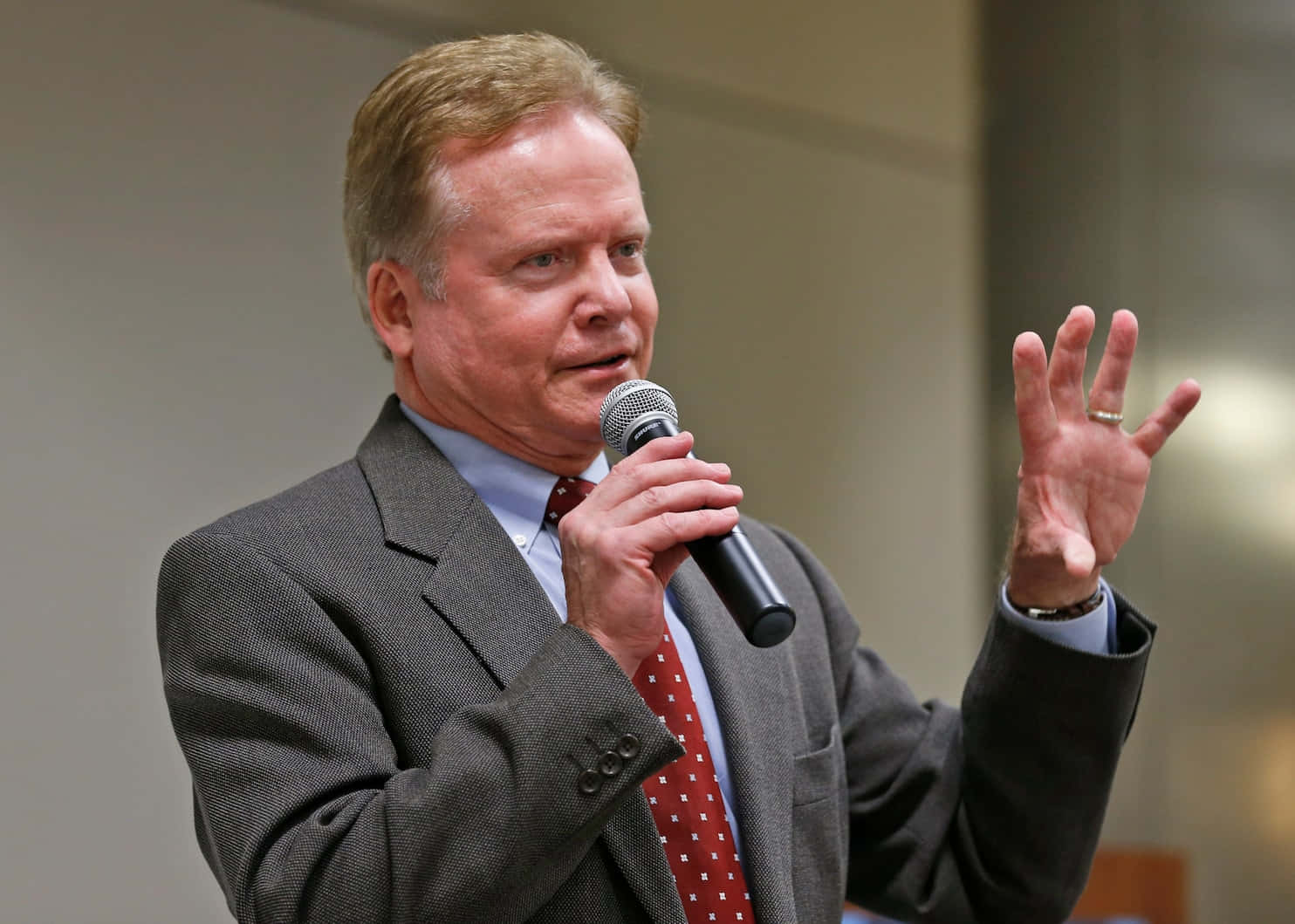 Jim Webb Holding A Microphone Wallpaper