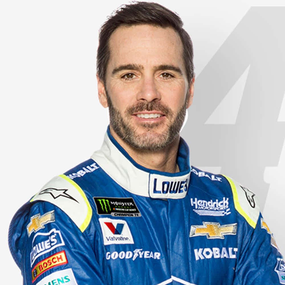 Jimmie Johnson Posing Next To His Nascar Race Car Wallpaper