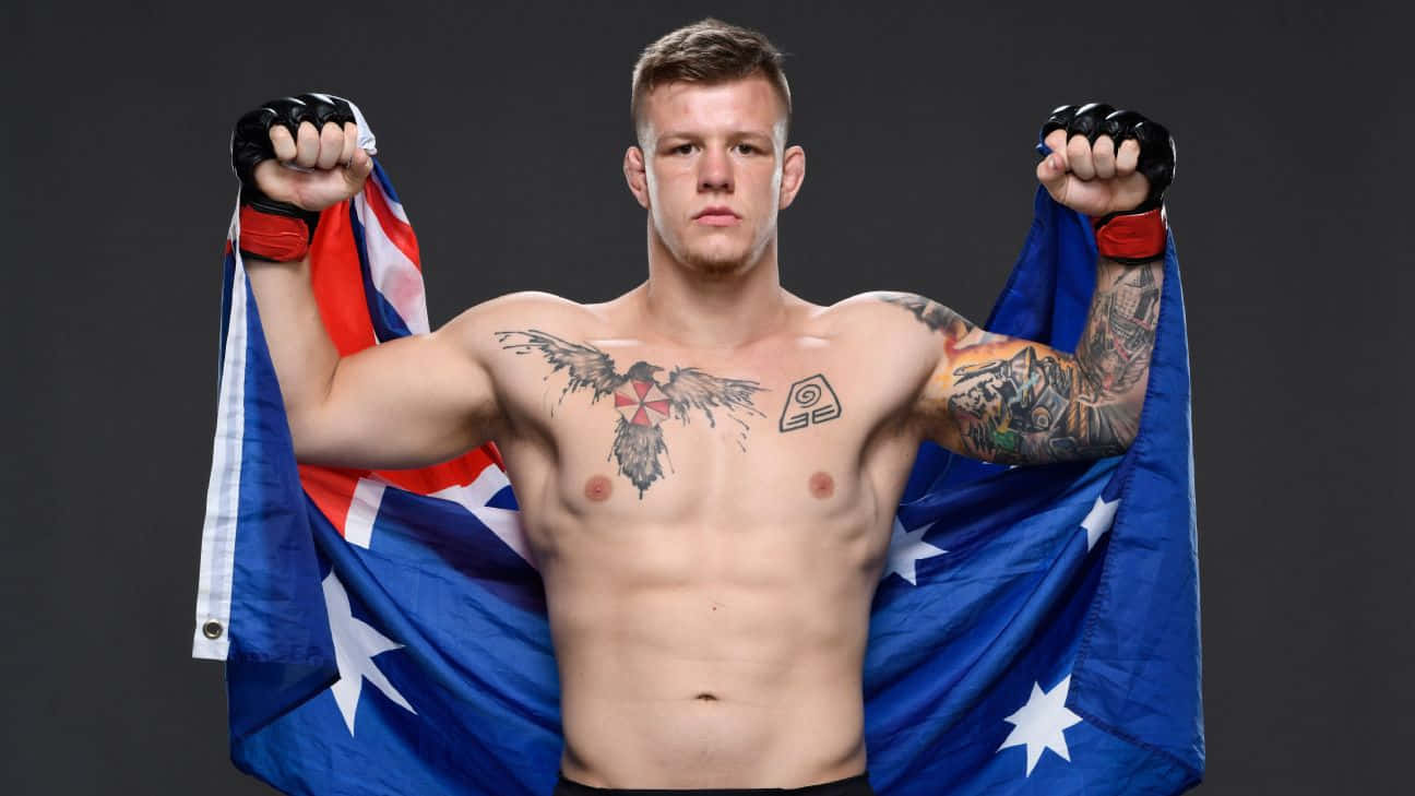 Jimmy Crute Flexing With Australian Flag Wallpaper