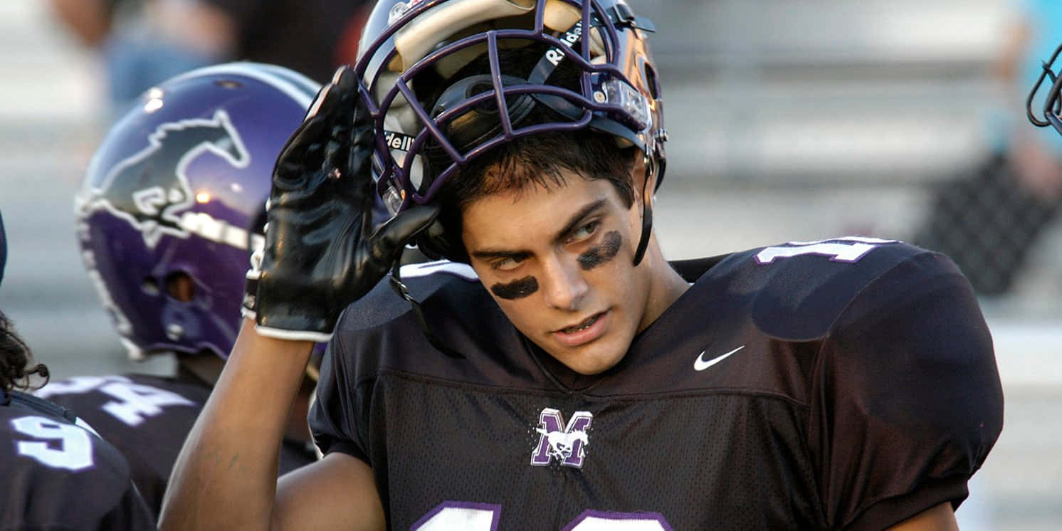 Jimmy Garoppolo In Action On The Football Field Wallpaper