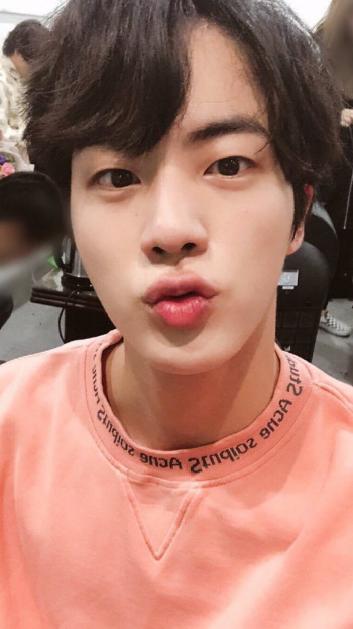 Jin Bts Cute Brown Hair And Salmon Shirt Wallpaper