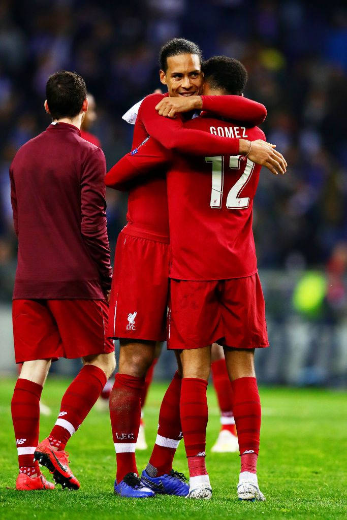 Joe Gomez Hugging Virgil Van Dijk Wallpaper