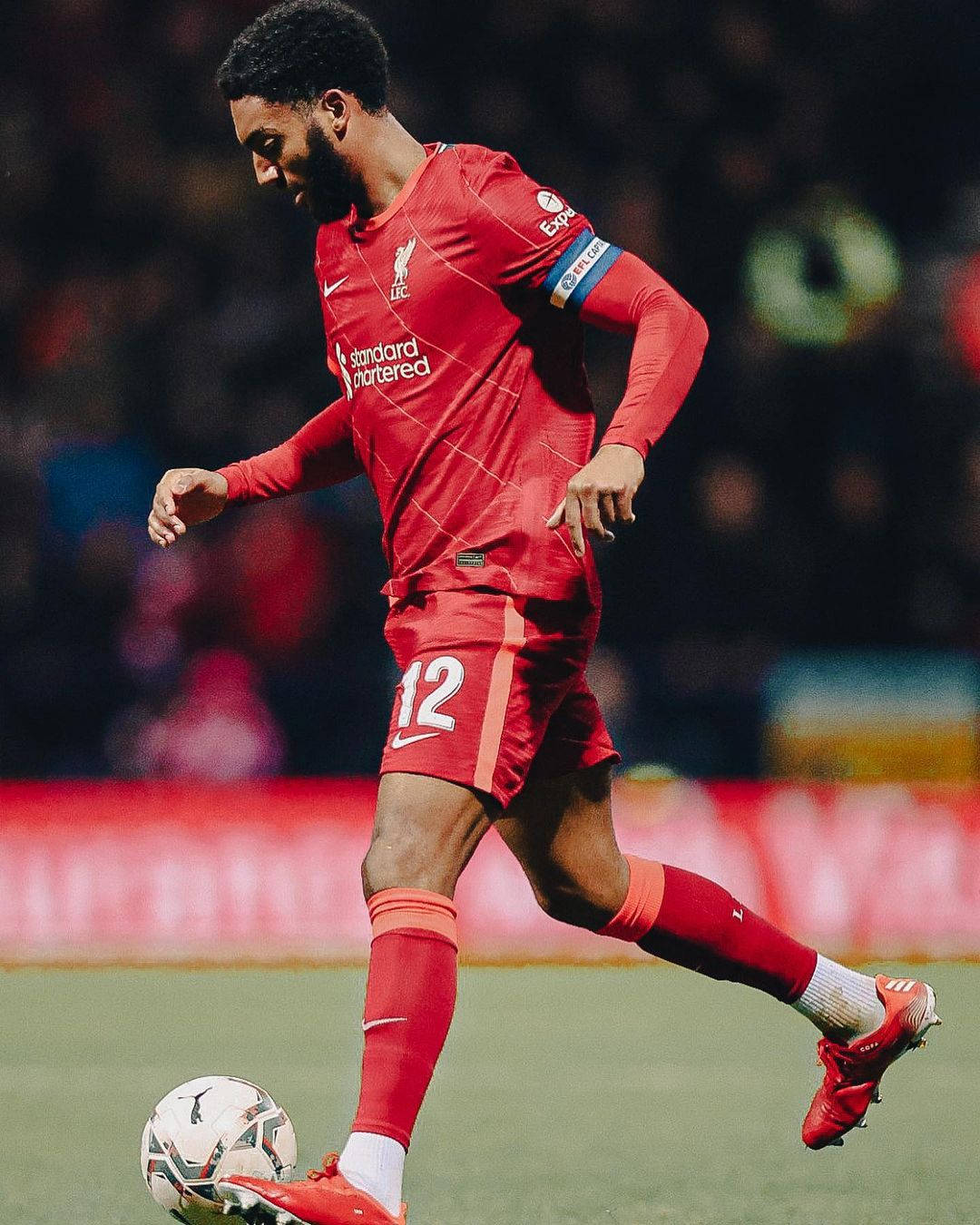 Joe Gomez Kicking Ball Full Body Wallpaper