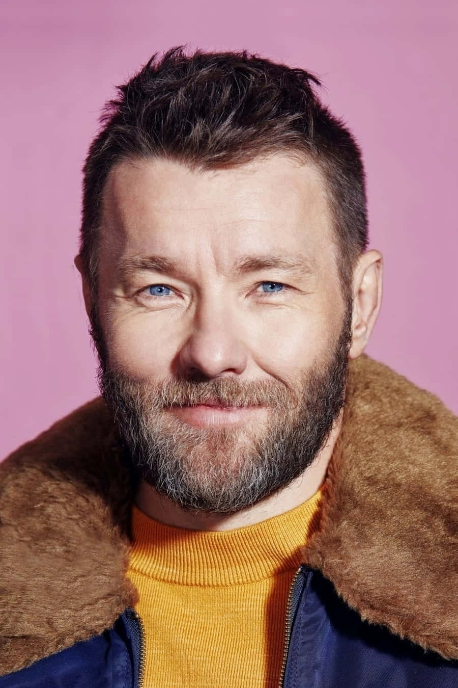 Joel Edgerton Portrait Pink Background Wallpaper