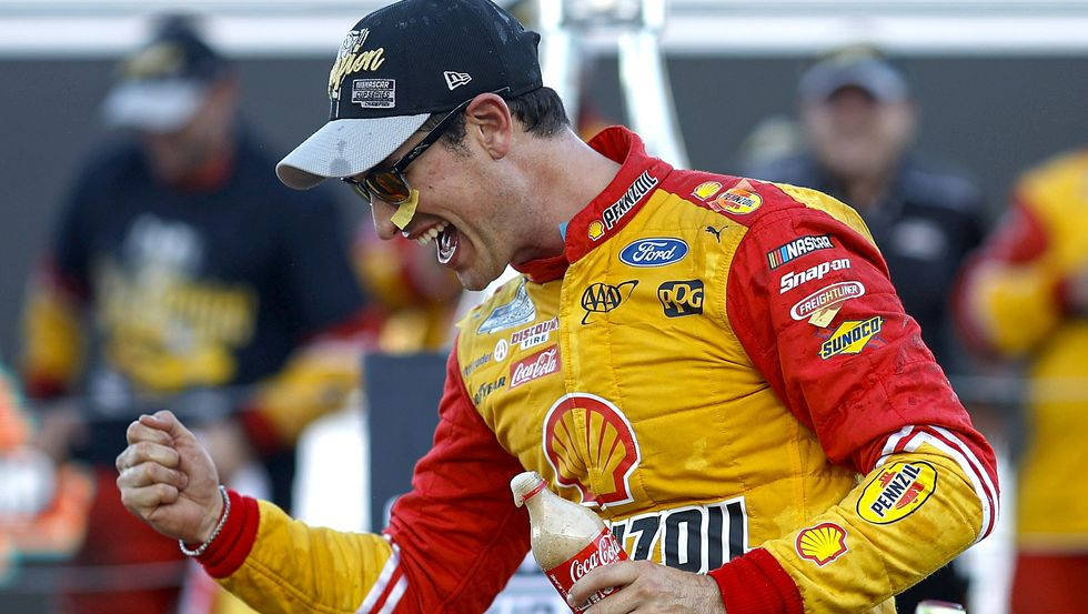 Joey Logano Holding Soft Drink Wallpaper