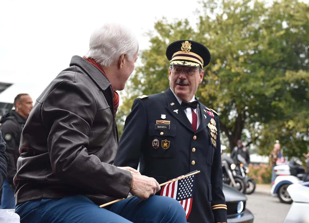 John Cornyn Talking To A General Wallpaper