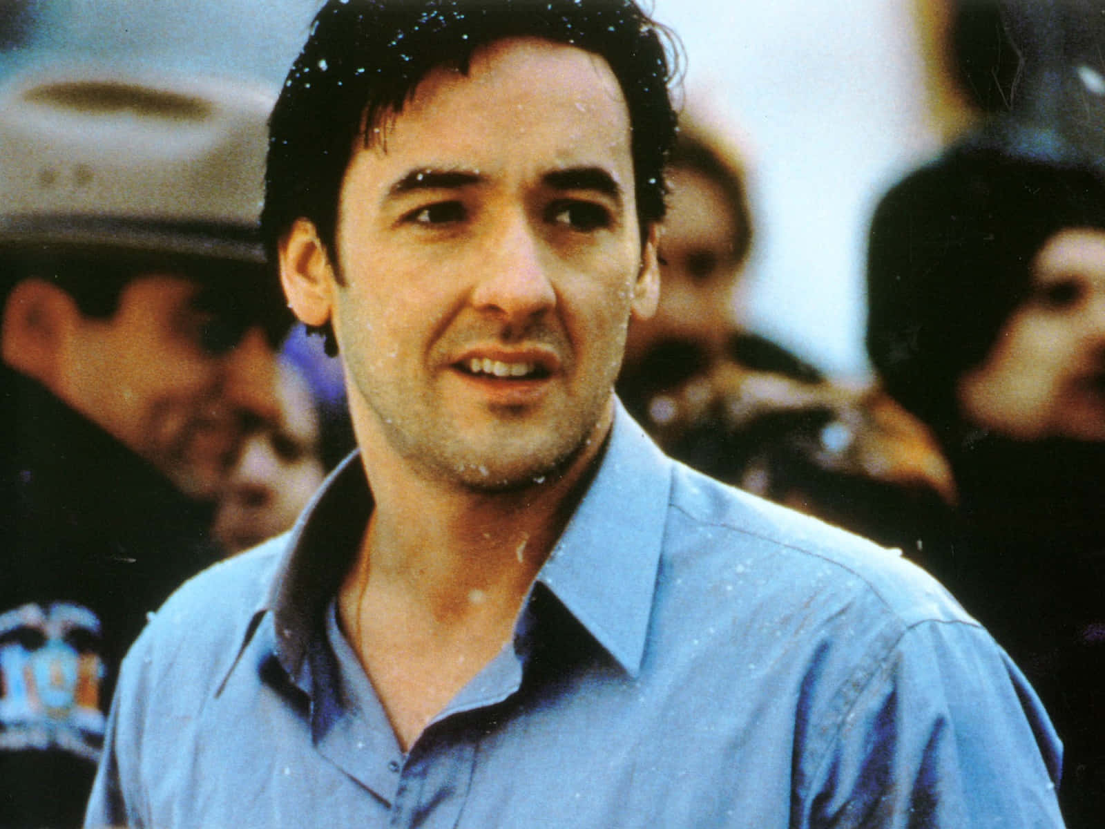 John Cusack In Thoughtful Pose Wallpaper