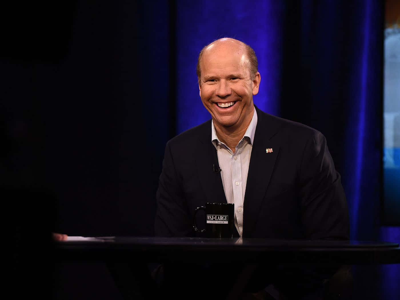 John Delaney Giving A Speech At A Public Event Wallpaper