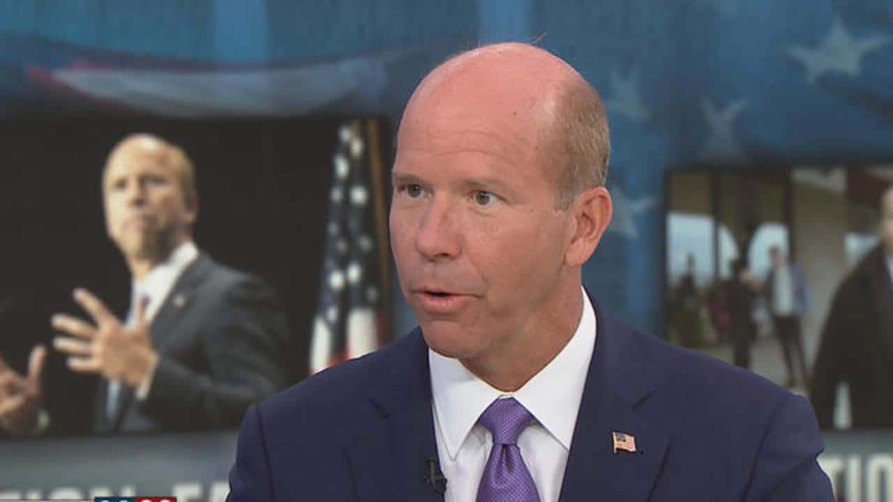 John Delaney Speaking At A Press Conference Wallpaper