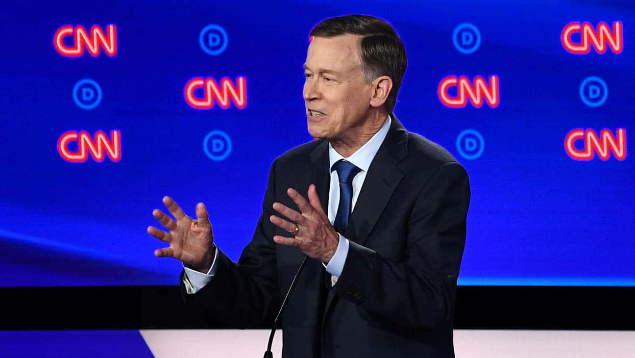 John Hickenlooper With Cnn Backdrop Wallpaper