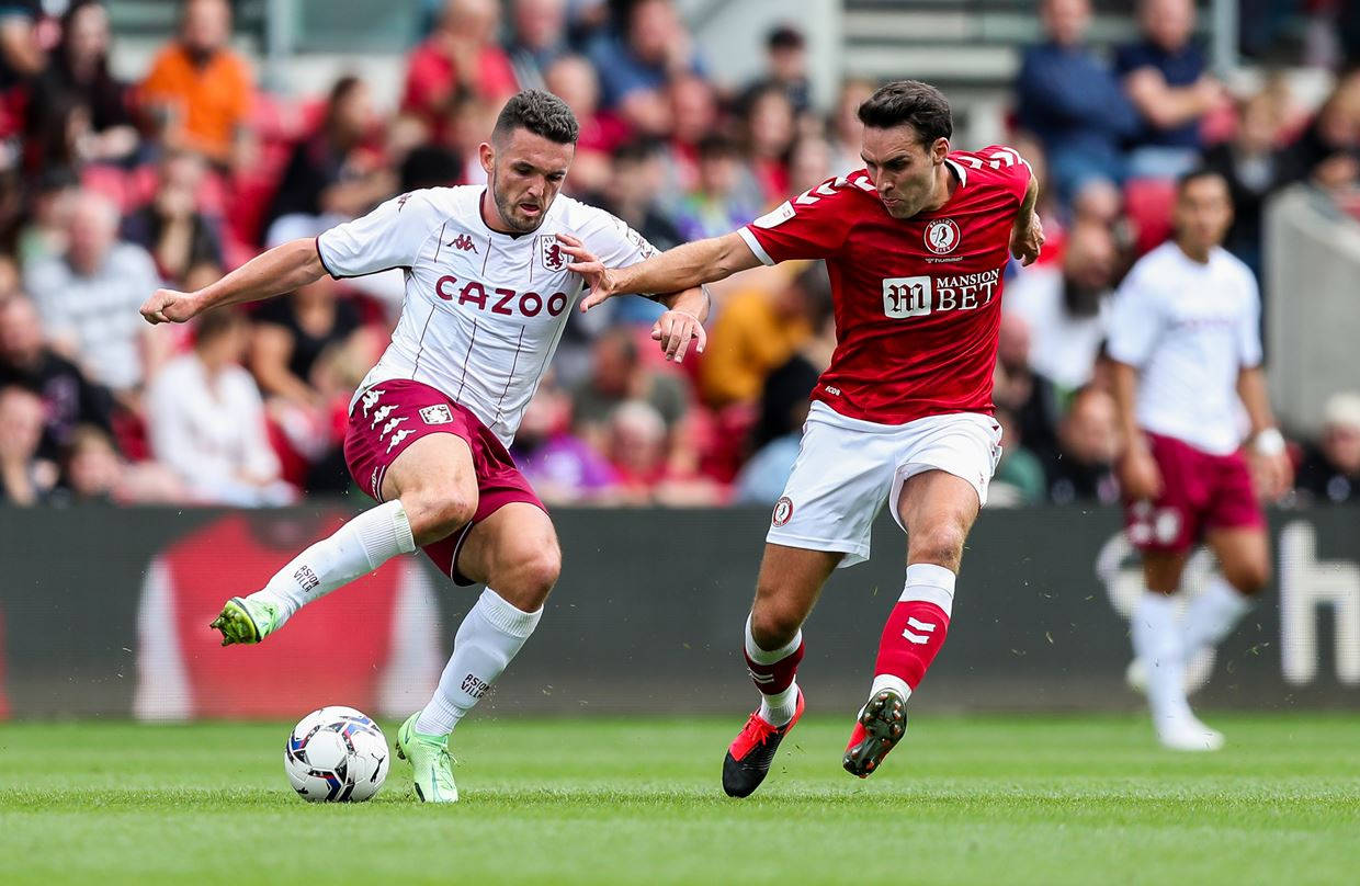 John Mcginn In Action For Aston Villa Fc. Wallpaper